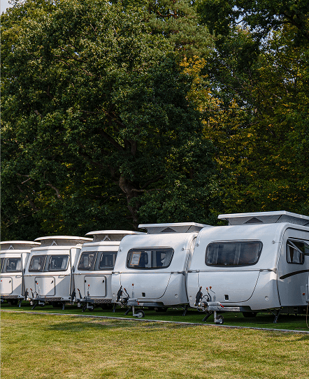 Caravans parked side by side